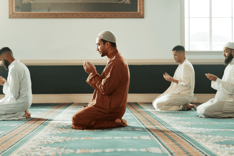 A group of muslim men praying